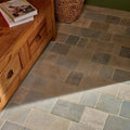 Gray stone castilan limestone cobbles tumbled tiles with rustic uneven texture and natural tone variations