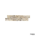 Scabos travertine split face ledger panel with banded rust, bronze and cream stone courses