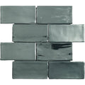 Dark gray glossy rectangular ceramic tiles arranged in a staggered brick pattern charm 30 x 30cm