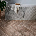 Gray and white marble-patterned bathtub with vertical ribbed texture in chatham porcelain walnut finish