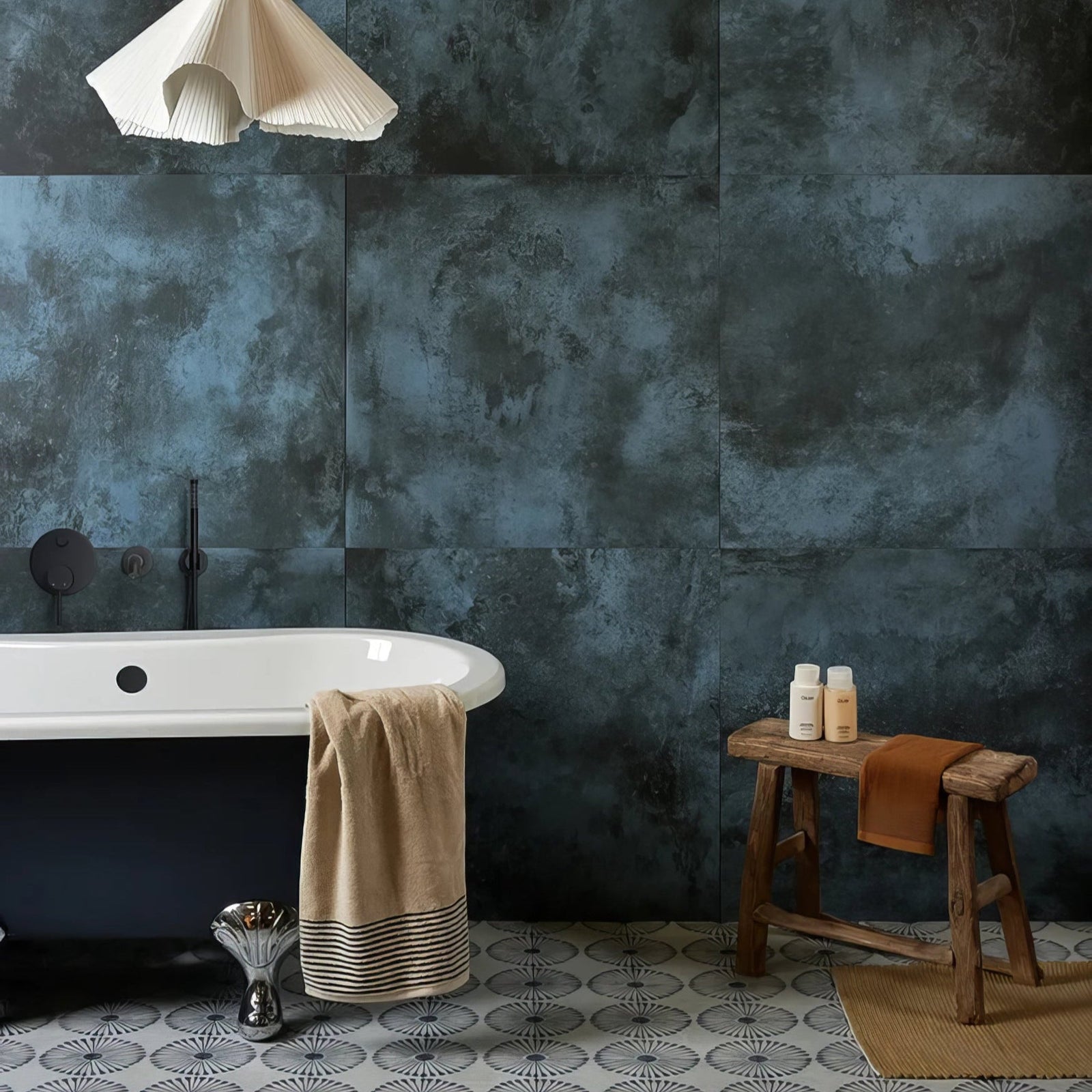 Dark blue textured porcelain wall tiles from chemistry porcelain denim collection ideal for interior design