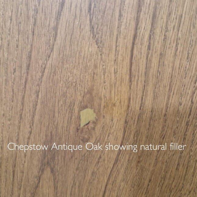 Chepstow antique oak wood surface with natural light brown grain and knot filled with matching beige filler