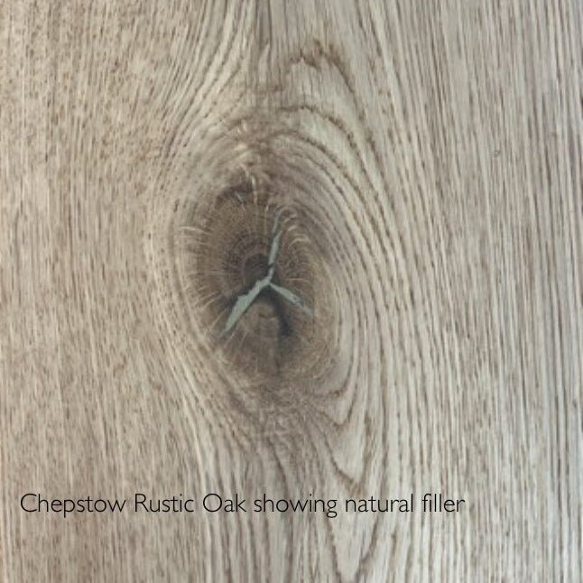 Chepstow rustic oak surface showing natural wood knot and detailed grain pattern in warm oak finish