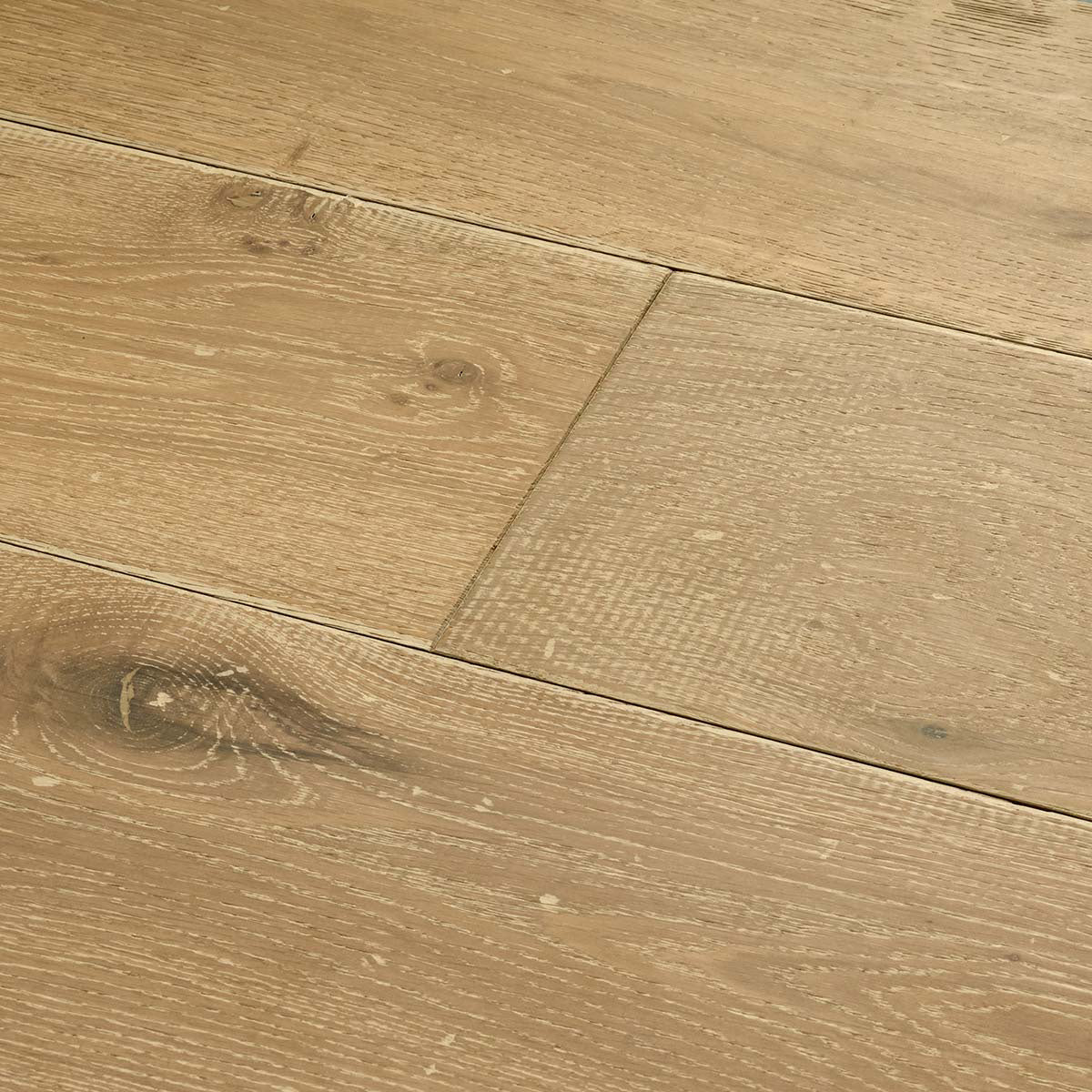 Light brown chepstow silverglade oak hardwood flooring with natural wood grain pattern and visible knots