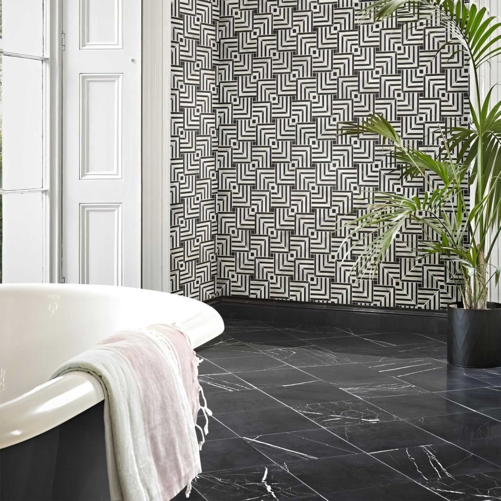 Black marble-effect floor tiles with white veining from chequers court deco mosaic collection