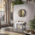 Chequers Court Double Hexagon white and black hexagon mosaic floor with a white sink on chrome legs and a round mirror