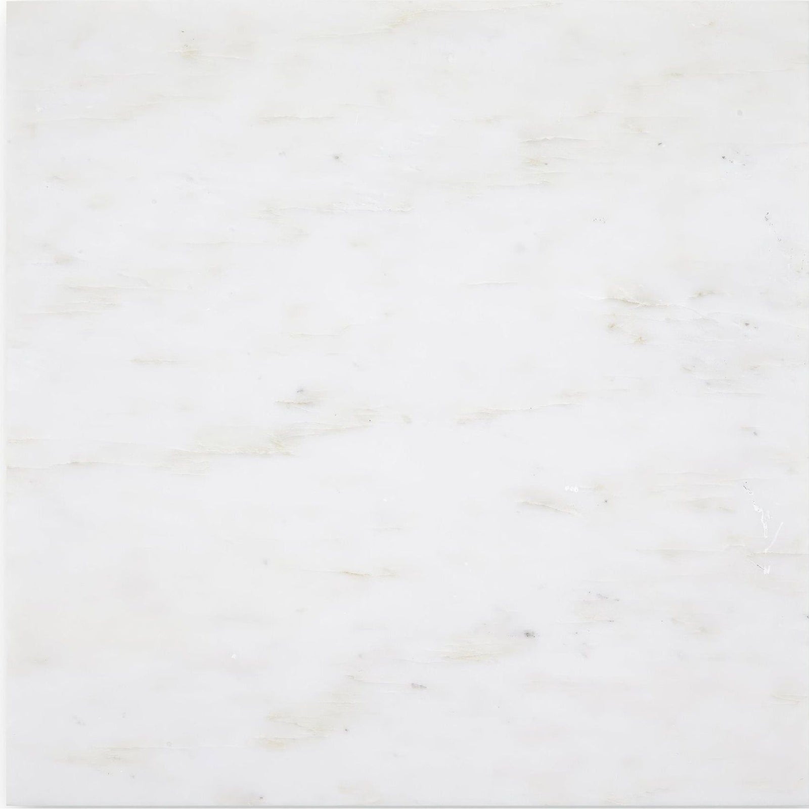 Chequers Court white marble tile with subtle veining showcasing smooth, polished natural stone surface
