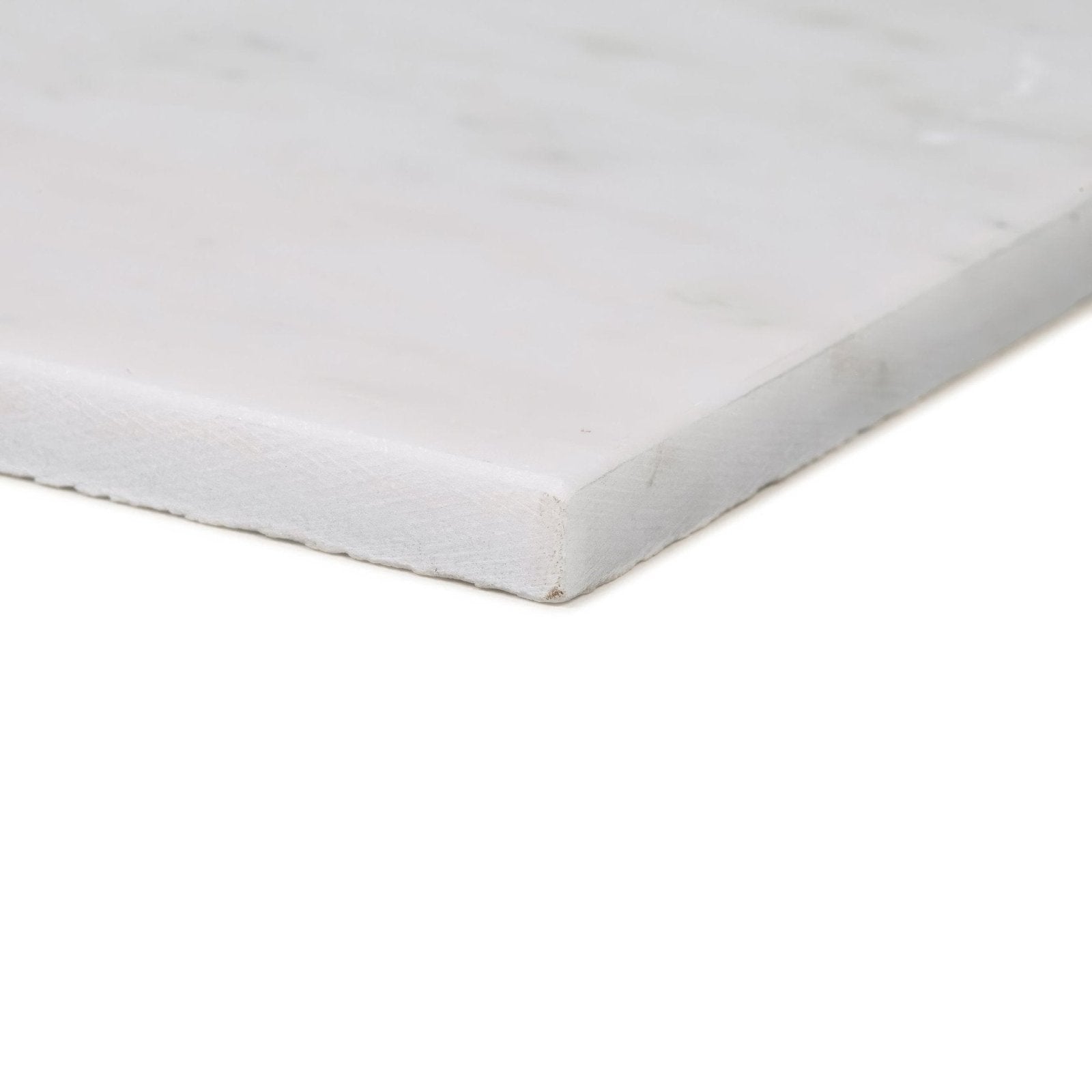 Chequers Court white marble tile with subtle gray veining and a smooth polished surface for elegant flooring