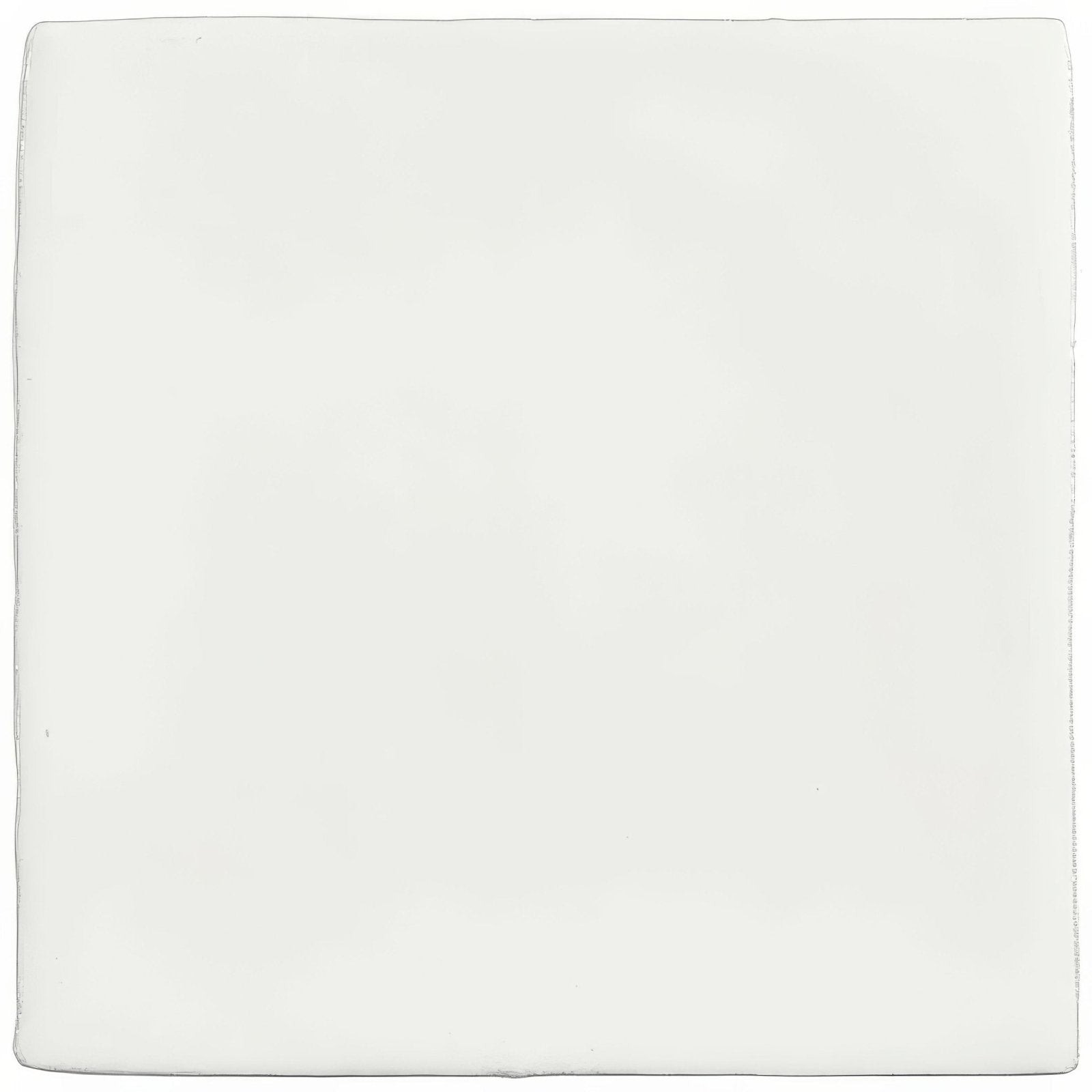 A sleek minimalist white ceramic china white field tile with smooth edges and a glossy finish