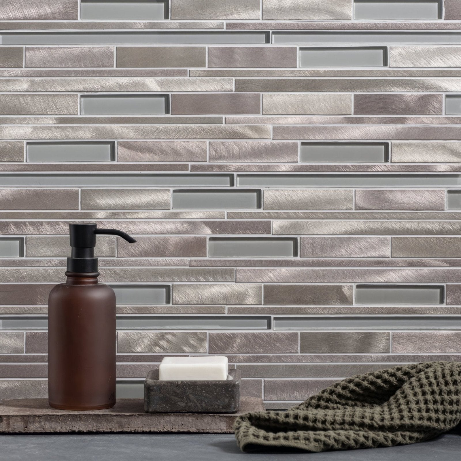 Chrysler glass and metal mosaic tile wall with sleek brushed metallic silver glass and varying horizontal strips design