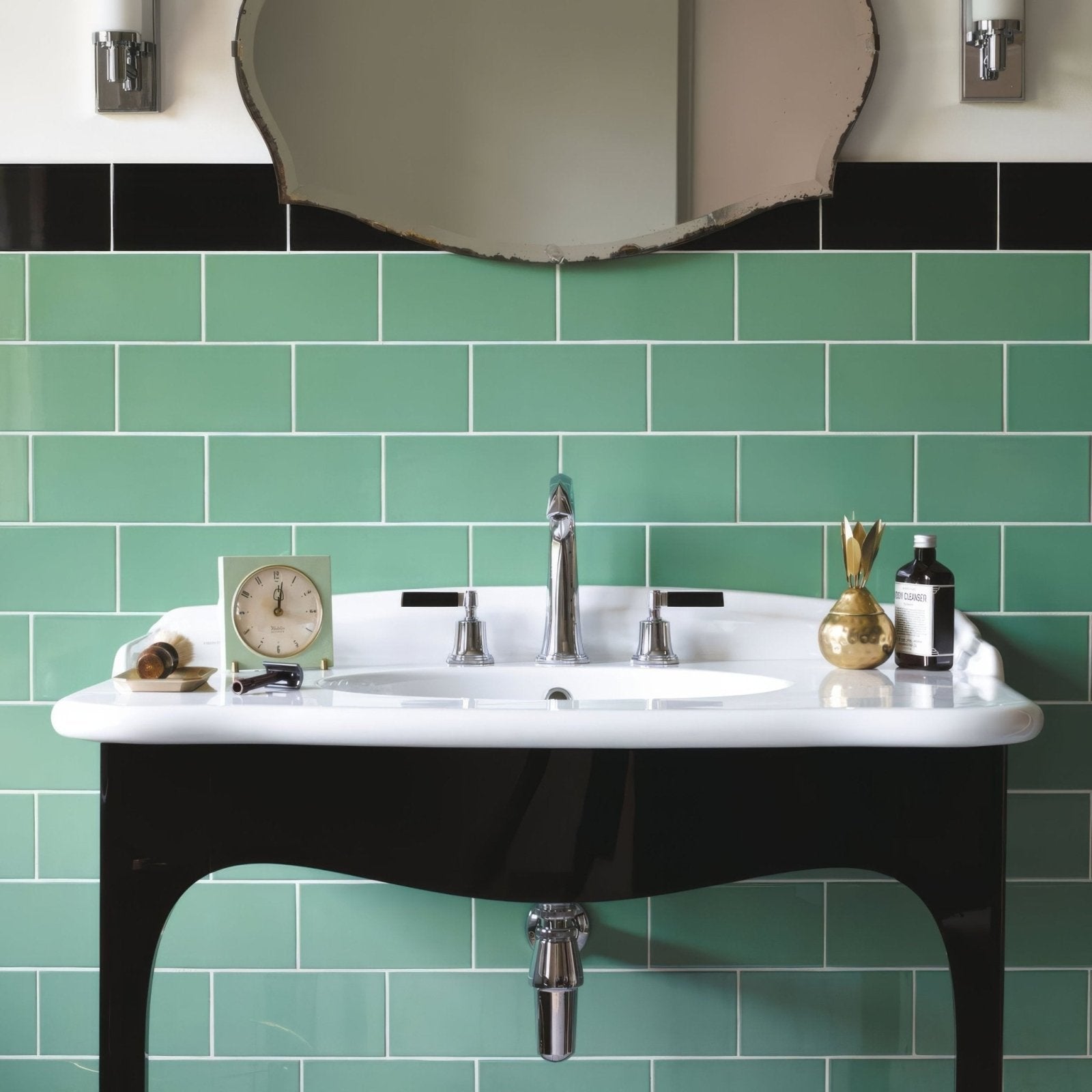 White ceramic sink with black lacquered base and chrome faucet displayed on cinema lincoln rectangle glazed tile wall