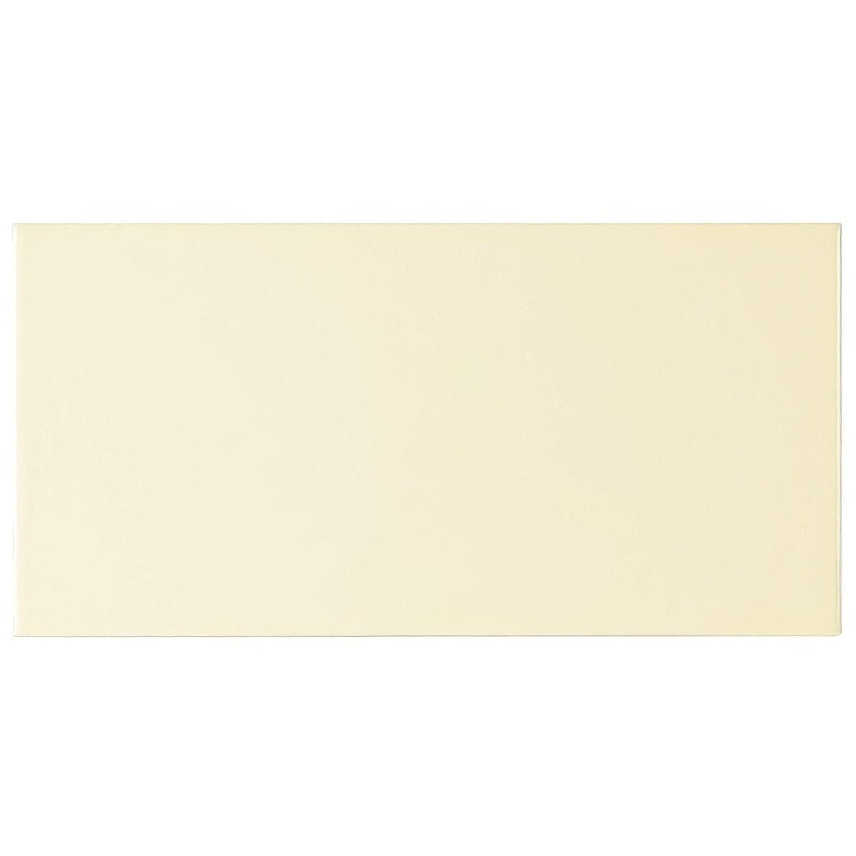 Cream-colored cinema rio rectangle glazed tile with a smooth matte finish and rectangular shape