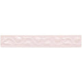 A delicate pale pink ceramic tile clare beaulieu with a subtle embossed wave pattern for decorative use
