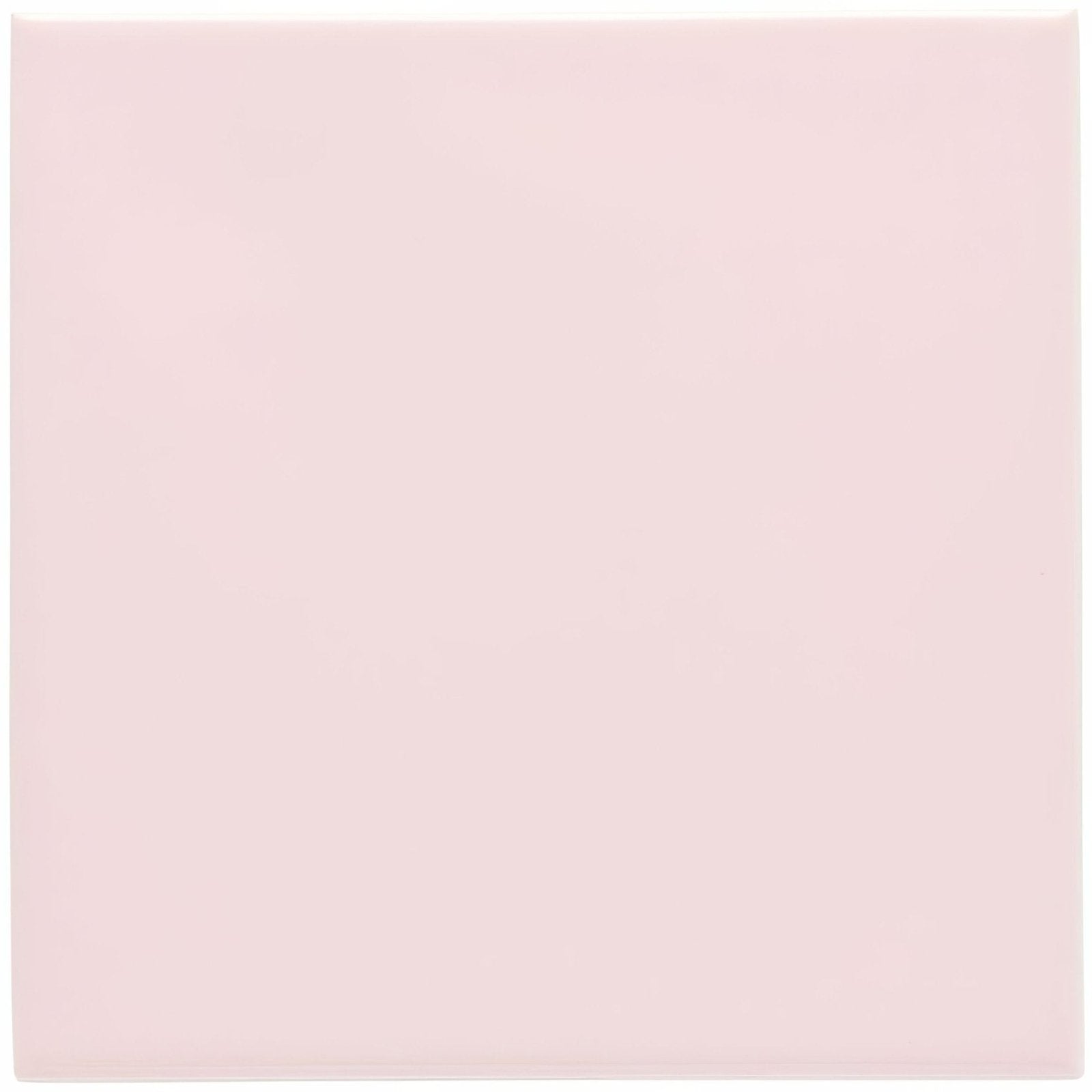 A smooth solid pale pink glossy ceramic square tile from Clare field tile collection
