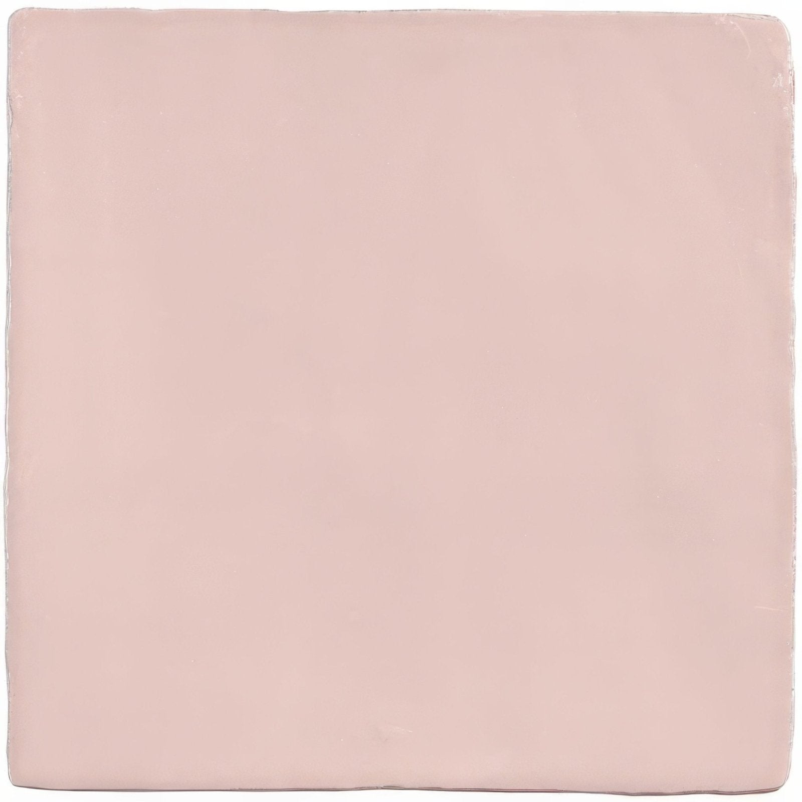 A smooth square ceramic tile with a soft blush pink glaze from the clover field tile collection