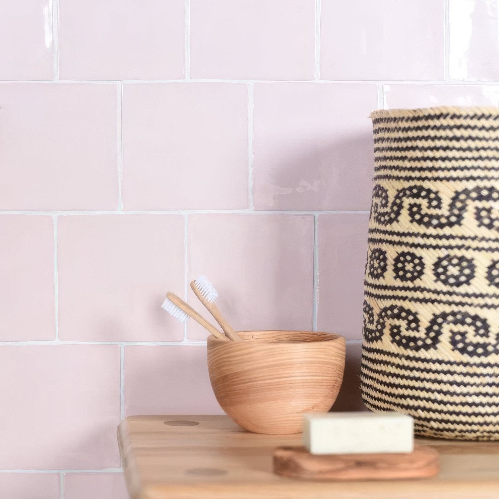 Woven clover field tile storage basket in black and beige with textured natural fiber design for home organization