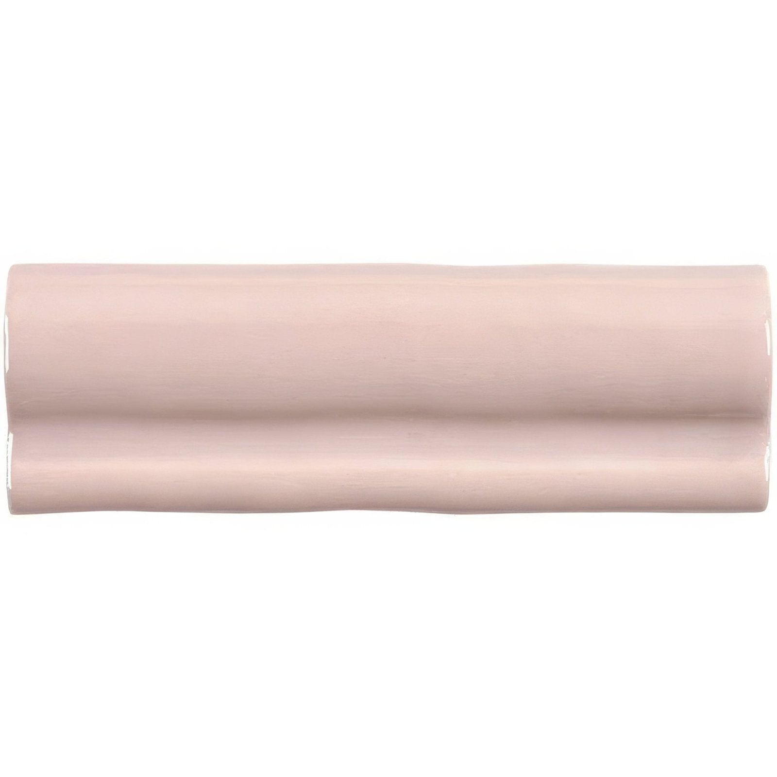 A sleek matte-finished pink ceramic clover torus moulding tile with subtle wavy texture and rounded edges