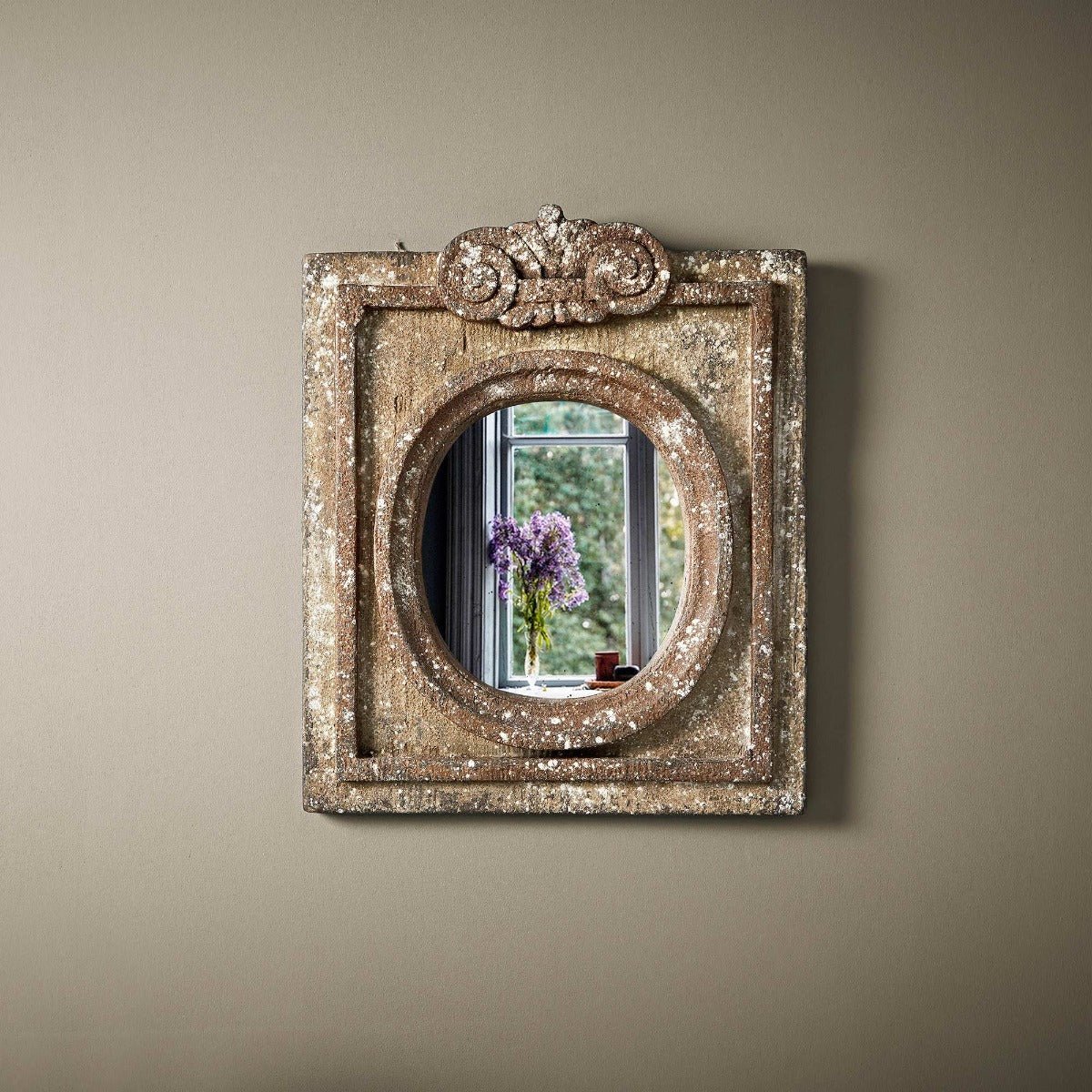 Cobble antique-style rectangular mirror with distressed metallic gold finish and ornate carved oval frame details