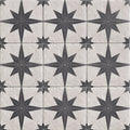 Black and white star-patterned compass white mosaic tile with textured stone-like finish for decorative surfaces