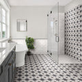 Black and white star-patterned ceramic floor tiles from compass white collection for bathroom use