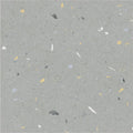 Confetti blue terrazzo effect tile in gray with yellow white black and light blue specks for decorative flooring