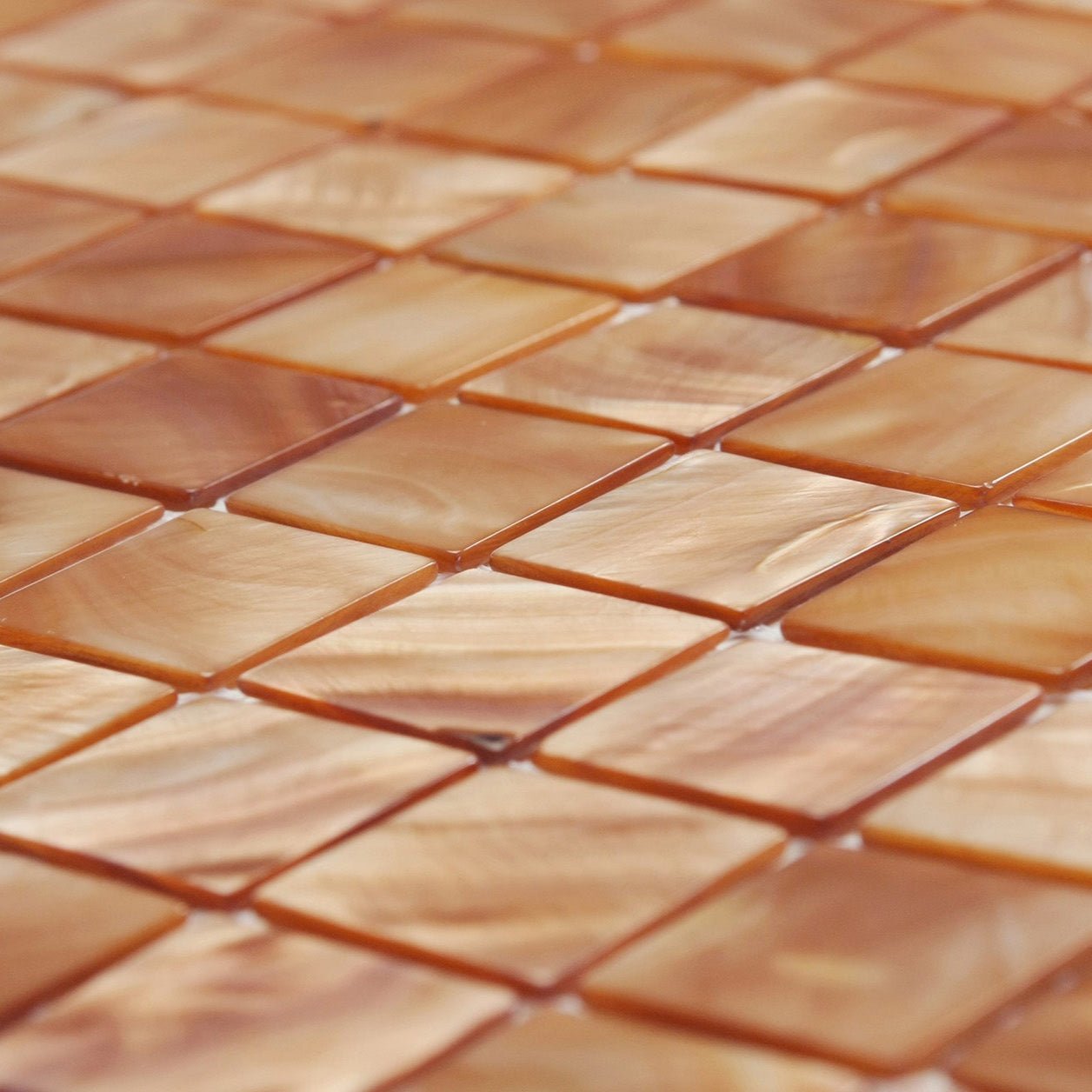 Copper 25mm square warm amber and cream-toned mosaic tiles with a glossy iridescent finish for decorative use