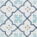 White ceramic tile cordoba decor 4 hand painted with soft blue and muted gray geometric diamond pattern and cutouts