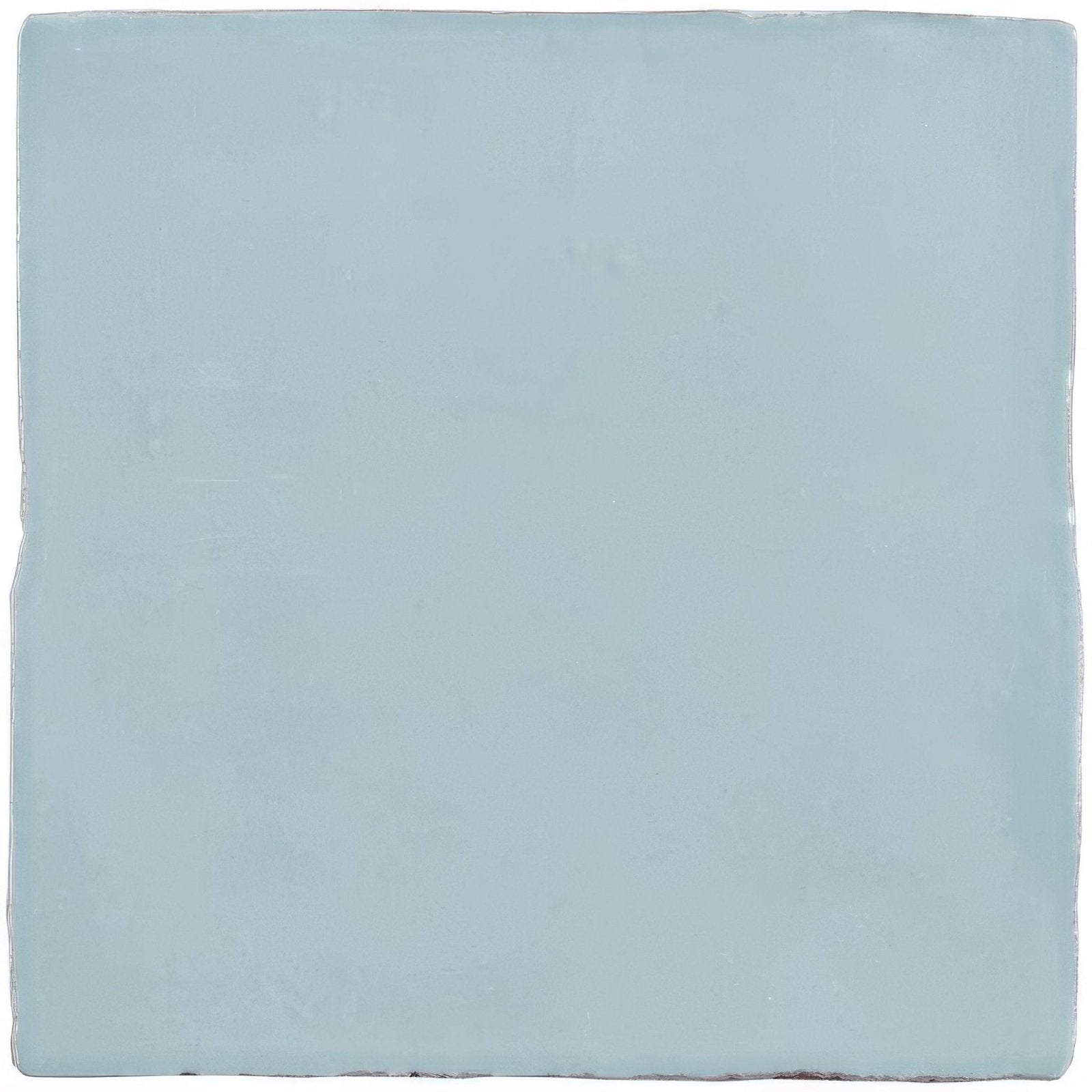 A square matte-finished ceramic tile in soft pale blue from the cornflower field tile collection