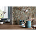The wall decorated with cosmopolitan amazzonite lappato 80 x 80cm tiles featuring teal and brown marble patterns