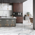 Cosmopolitan Statuario Extra Matt 80 x 80cm white marble-effect tiles in a kitchen with dark wood cabinetry