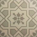 Cotehele grey on chalk tile featuring gray and cream floral motif with surrounding geometric patterns