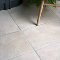 Beige stone-effect porcelain floor tiles with subtle natural veining from cotehele opus porcelain sand collection