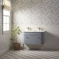 Light blue cottage garden vanity with white ceramic sink and chrome faucets featuring 18 tile panel design