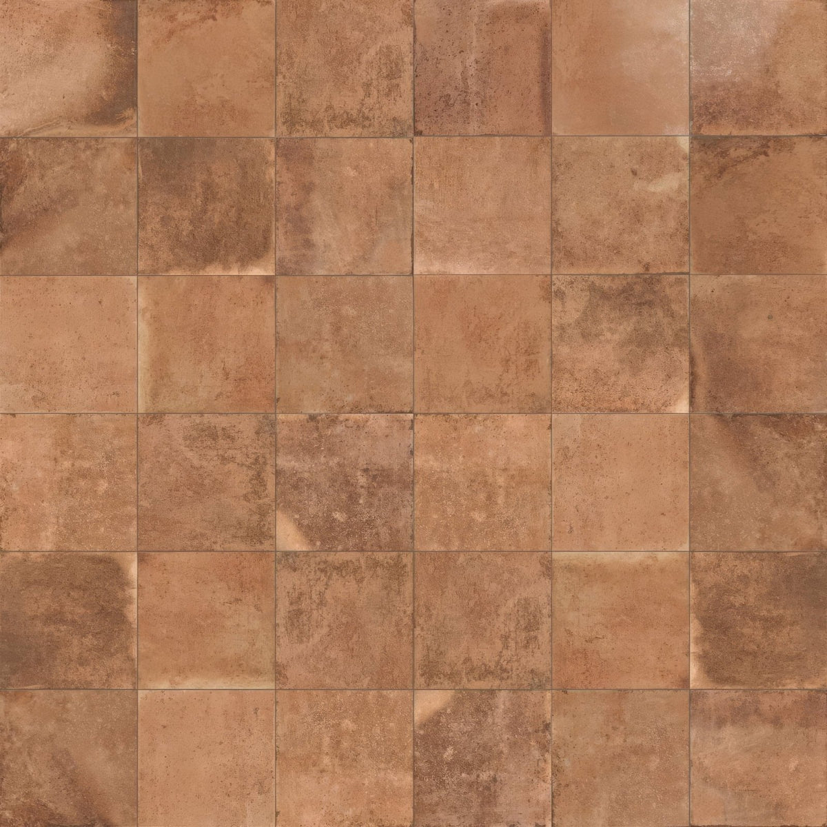 Terracotta-colored cotto cuero terracotta effect square tiles with a rustic textured surface for flooring and walls