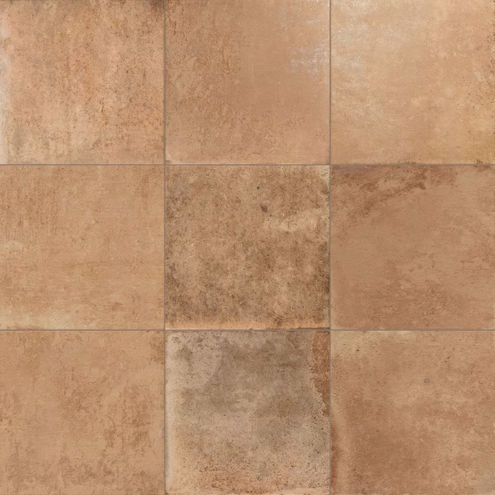 Beige and tan textured ceramic floor tiles with a rustic stone like finish cotto natural terracotta effect tiles