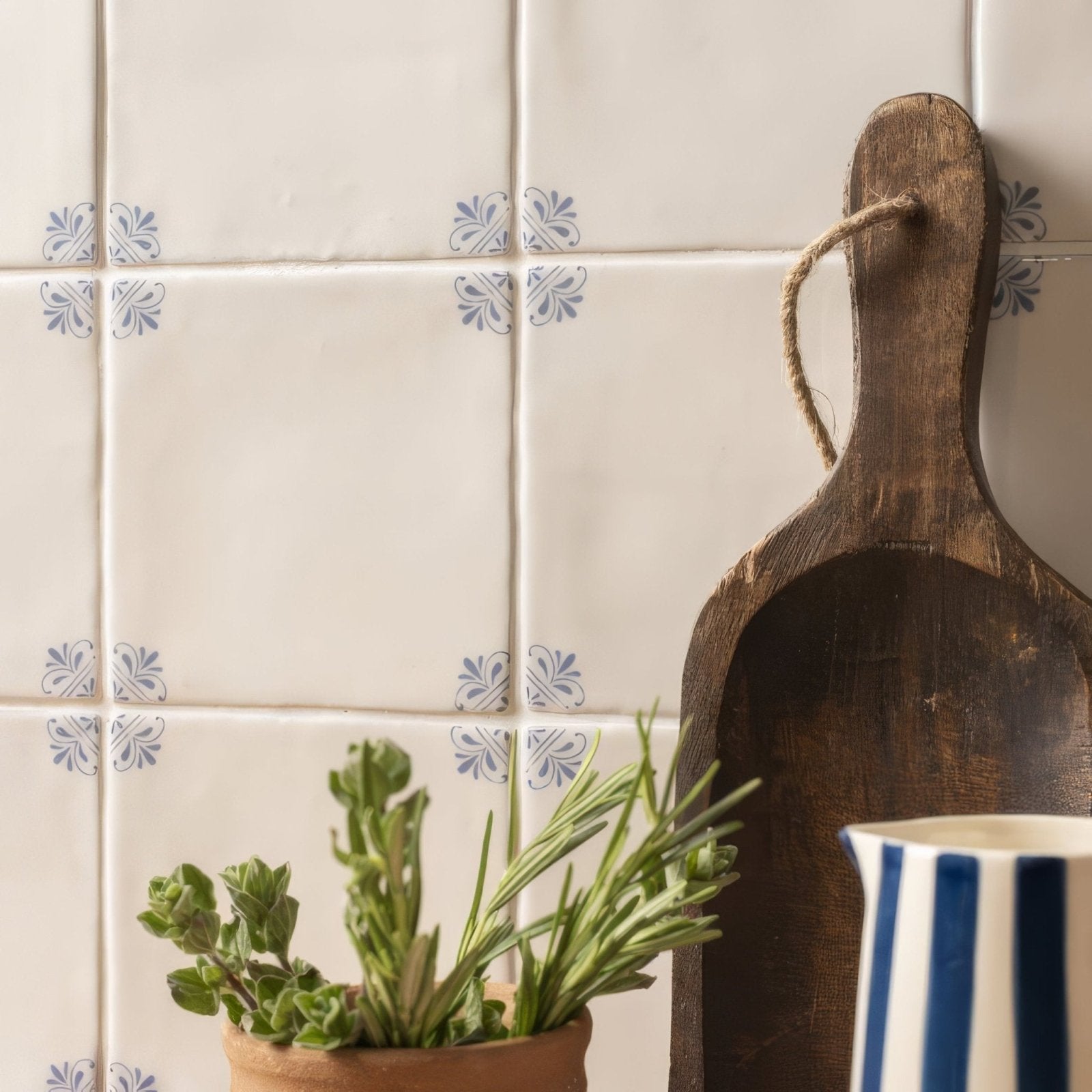 Country delft beatrix rustic wooden cutting board with natural weathered finish and rope handle for kitchen use