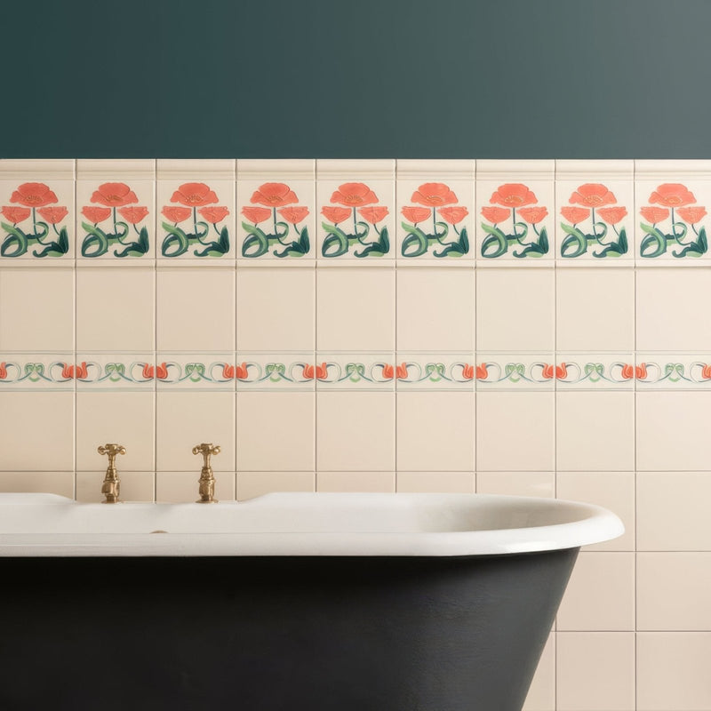 Beige ceramic county white field tile with decorative orange poppy border and green leaf floral motif
