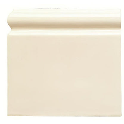 Cream-colored smooth-surfaced county white skirting left hand corner baseboard with a classic profile