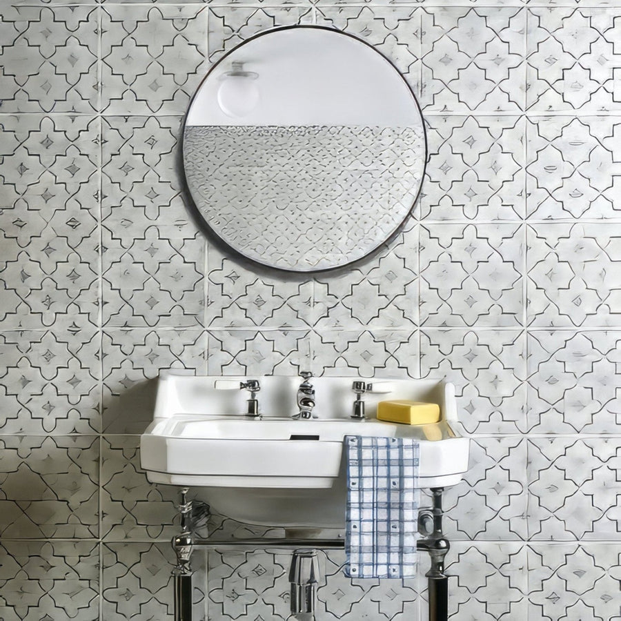 Round mirror with a black frame and textured glass surface from Cuba Porcelain Como collection