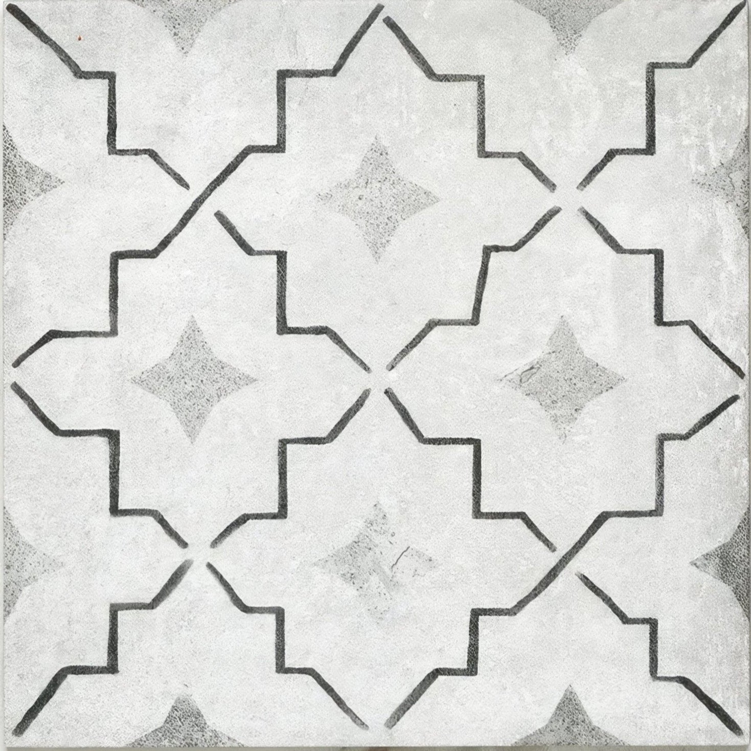 Cuba porcelain como tile with gray and white geometric pattern and black outlined starburst shapes