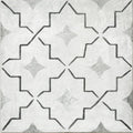 Cuba porcelain como tile with gray and white geometric pattern and black outlined starburst shapes