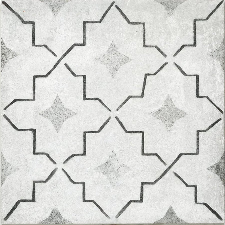Cuba porcelain como tile with gray and white geometric pattern and black outlined starburst shapes
