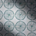 White porcelain tiles with a repeating dark green floral petal pattern from cuba porcelain infantas green collection