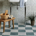 Woven wicker basket with a wooden brush inside featuring cuba porcelain mint green field design