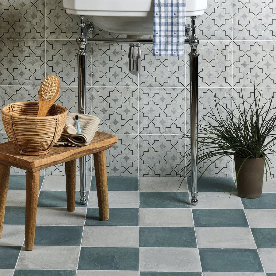 Woven wicker basket with a wooden brush inside featuring cuba porcelain mint green field design