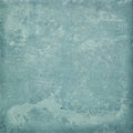 A textured teal green cuba porcelain tile with a mottled weathered surface for durable flooring and walls
