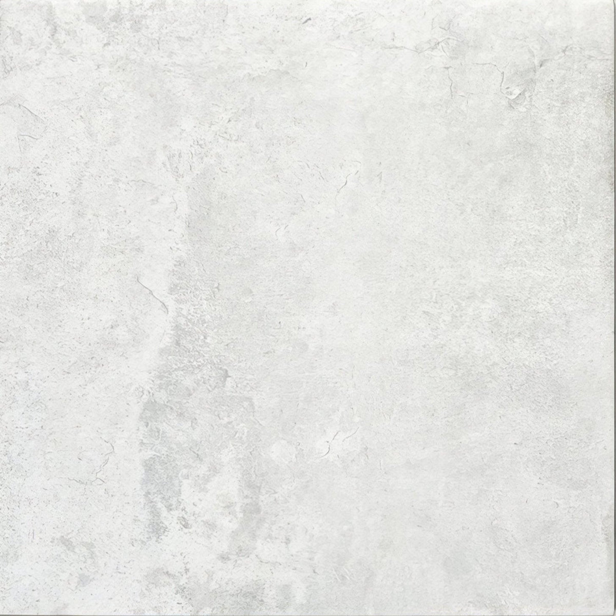 White textured porcelain tile with subtle gray veining from Cuba porcelain pearl grey field collection