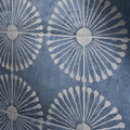 Blue and white sunburst-patterned ceramic floor tiles in cuba porcelain vedado indigo design