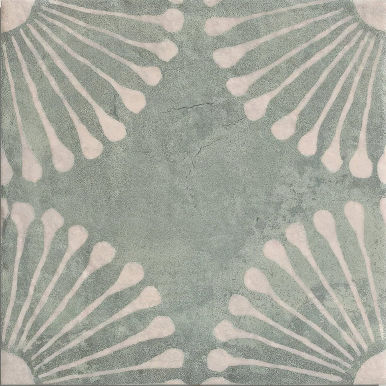 A square ceramic porcelain tile with a muted mint green base and distressed white teardrop pattern called cuba porcelain vedado mint green