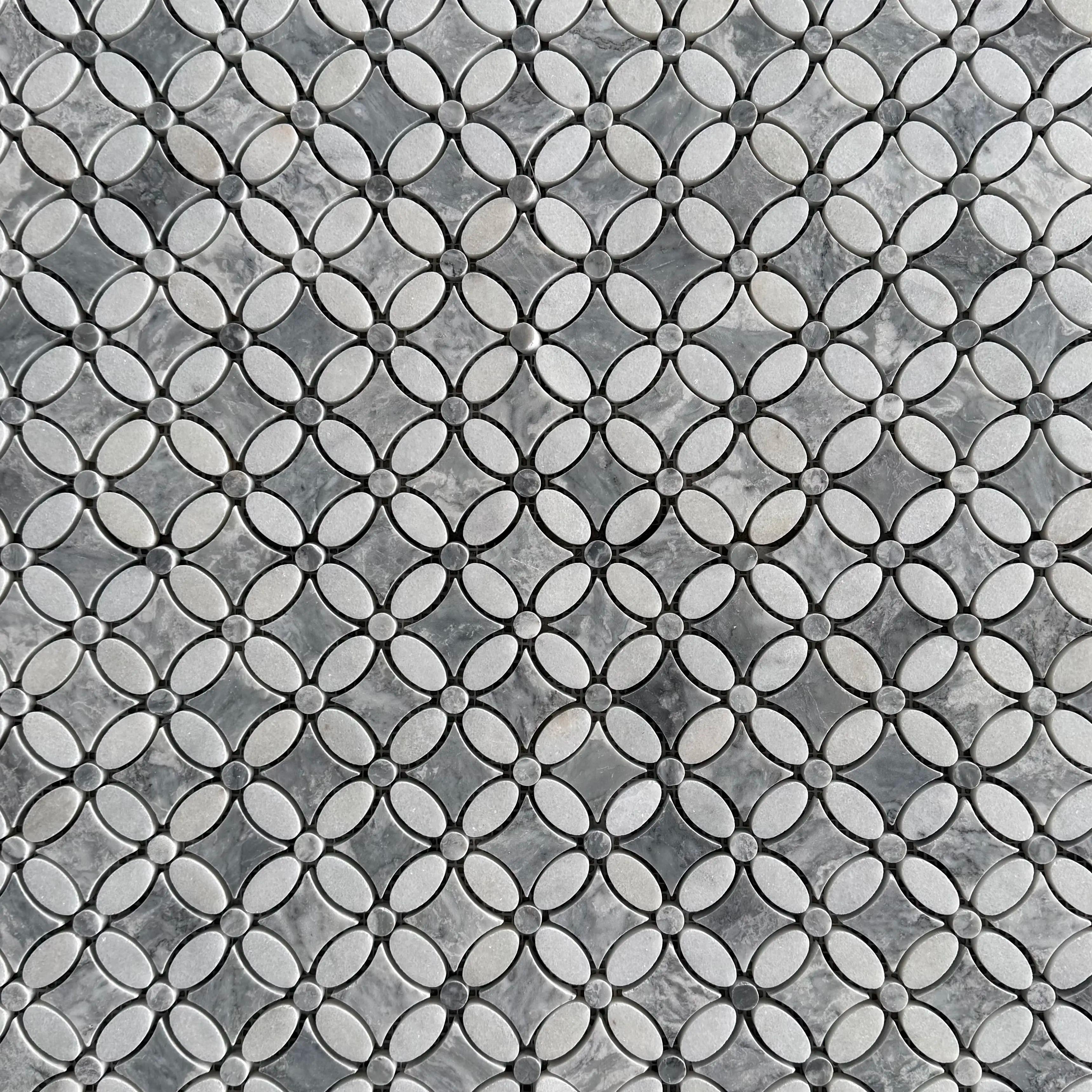 Close detail of the grey marble centre and white Carrara petals in the polished flower mosaic